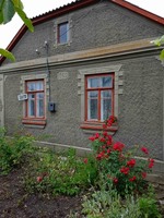 Дім з літньою кухнею та гаражем