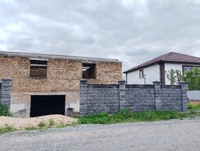 Продам ділянку з недобудованим будинком